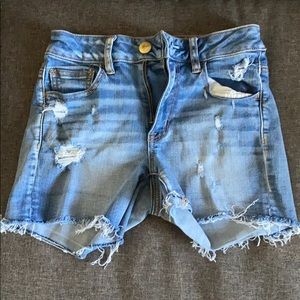 Super stretch light wash denim distressed shorts